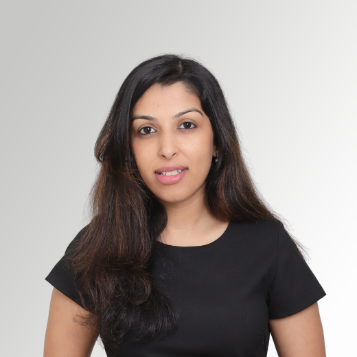 pic of Astha in light grey background