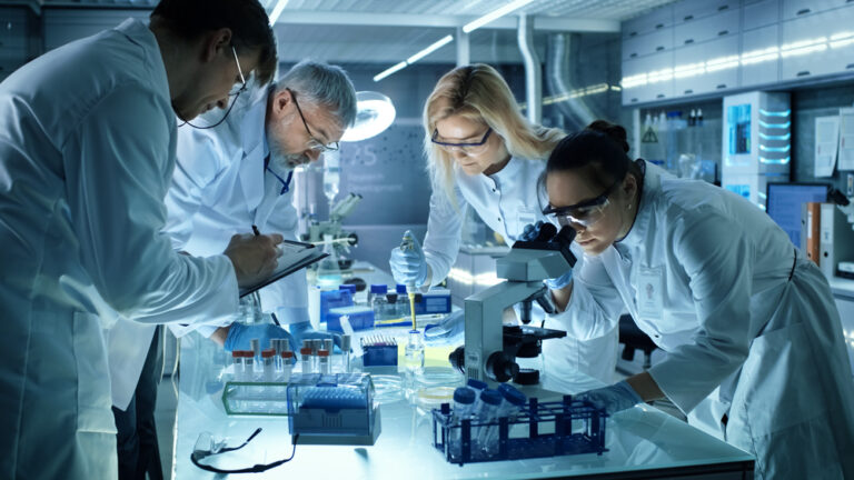 Four medical researchers in a laboratory