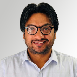 Photo of man over white background in glasses- Varun Manhas