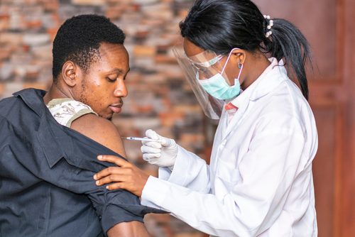 Persono receiving vaccine